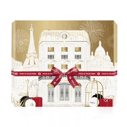 Calendrier de l'Avent L'Oréal Paris 2025 contenant 24 produits de beauté en taille réelle pour le maquillage et les soins du visage présenté dans un coffret élégant doré et blanc